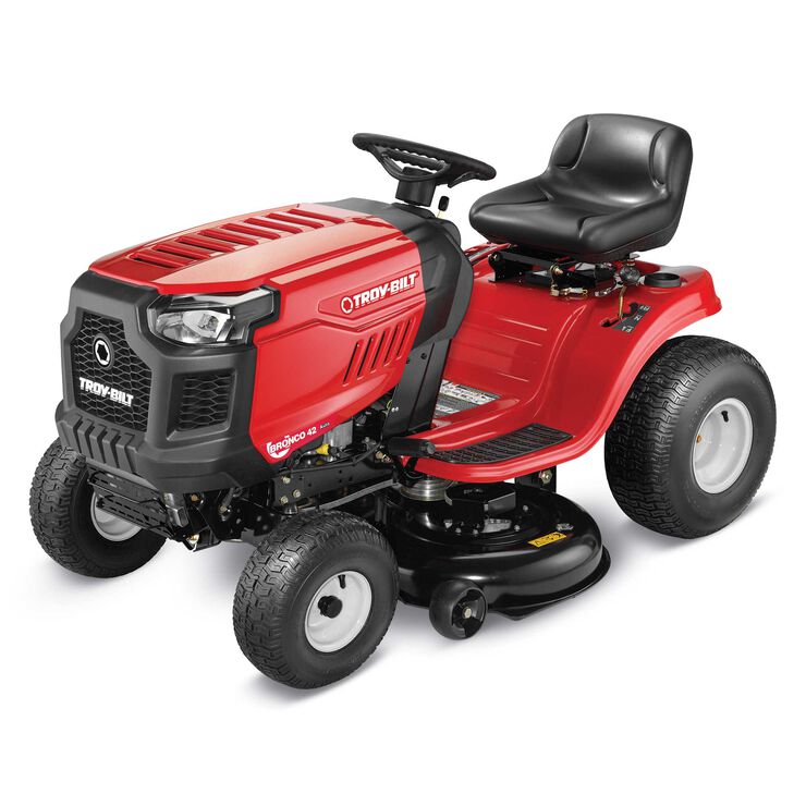 Red riding lawn mower with black seat on a white background