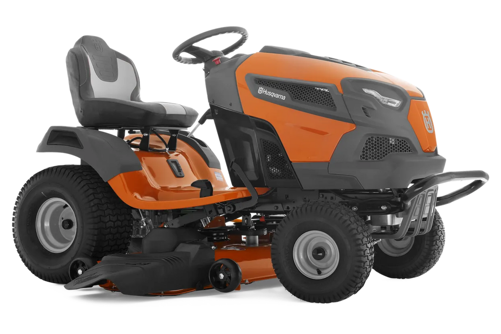 Orange and black riding lawn mower on a white background
